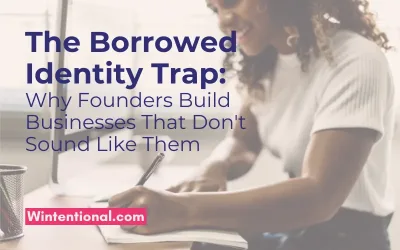 A woman writing in a notebook at a desk, titled The Borrowed Identity Trap