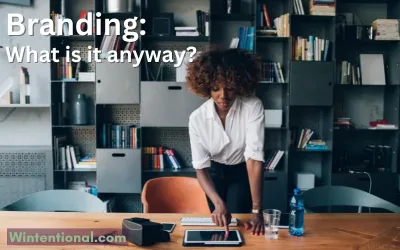 A woman working at a desk in a home office, titled Branding: What is it anyway?